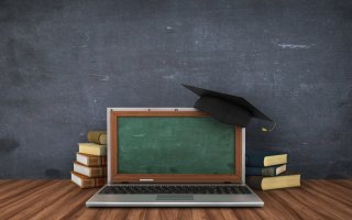 computer and chalkboard