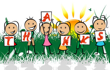 Kids holding thanks sign 