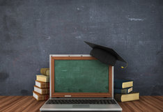 laptop with grad cap